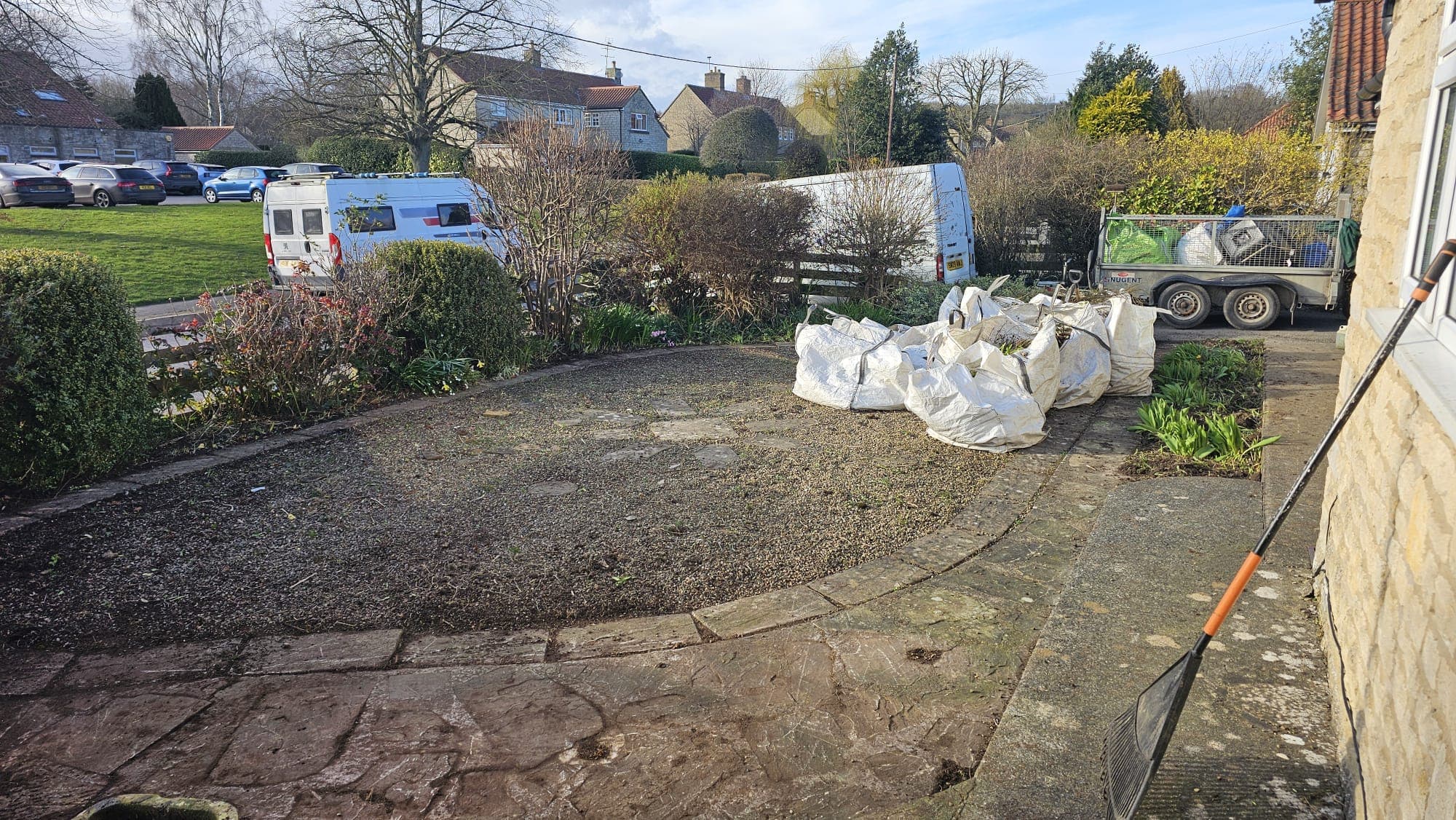 Border tidying — Cut-back, weed, mulch and edge.